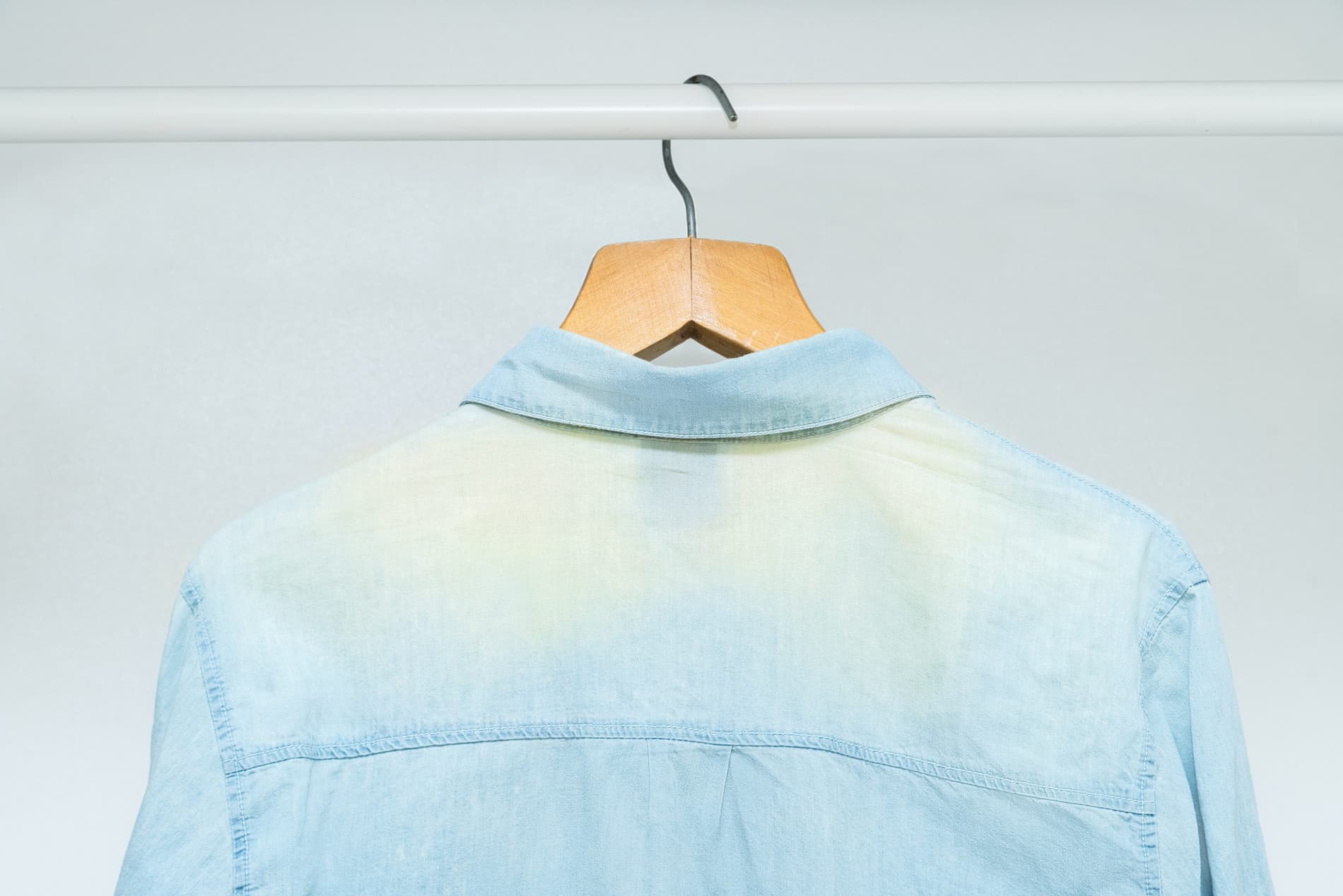 https://mybutlerservice.com.au/wp-content/uploads/2021/06/worn-out-bleached-out-old-classic-business-shirt-hanging-wardrobe.jpg
